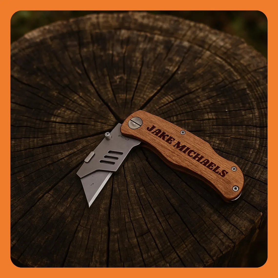 A folding knife with a wooden handle and a silver blade, resting on a wooden surface.