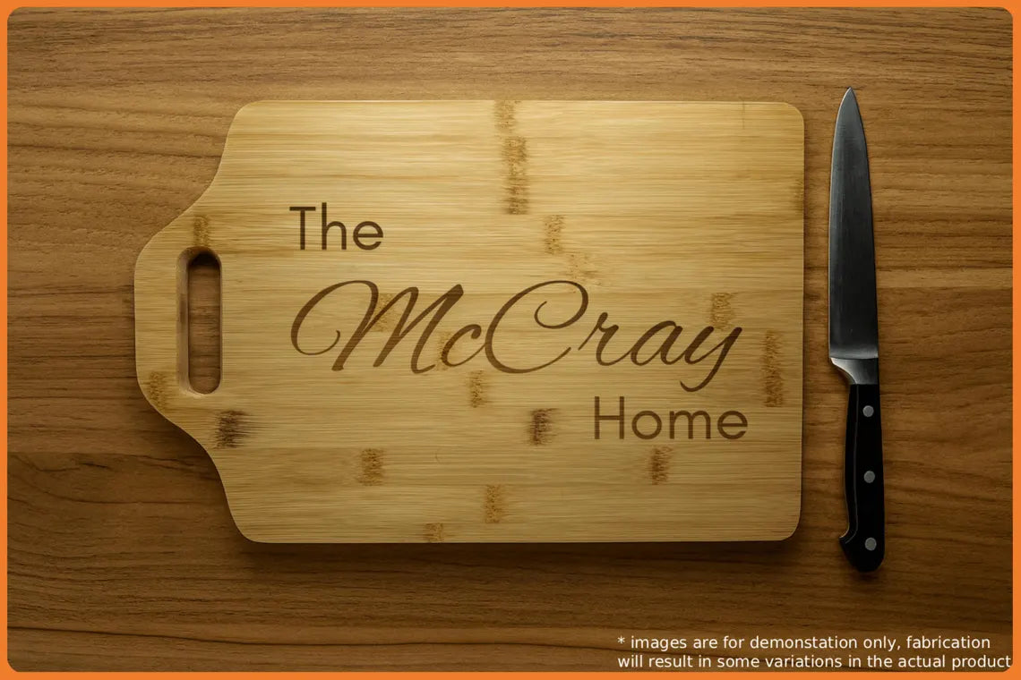 Personalized wooden cutting board with the name 'McCray' engraved.